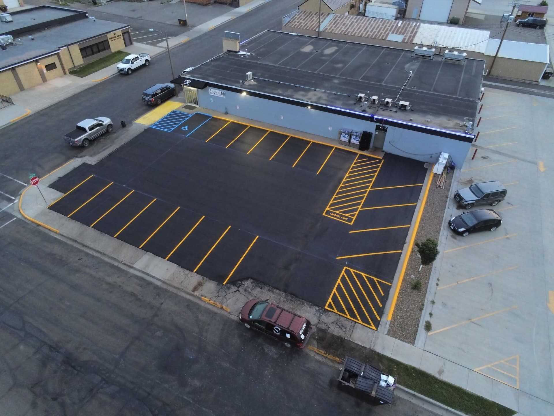 Gallery photos for Crack Sealing, Sealcoating, and Line Striping at Jack and Jill in Watford City: Image #1