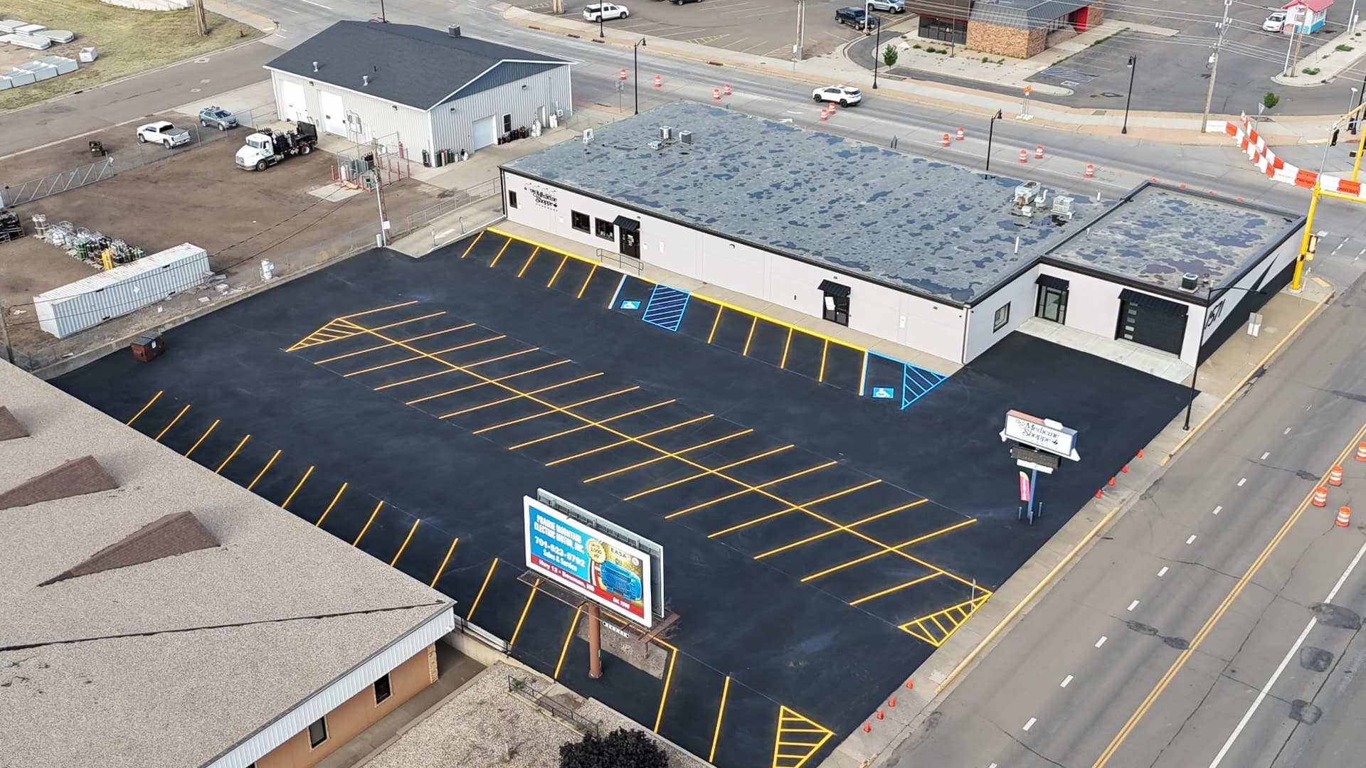 Parking Lot Sealcoat and Striping at Medicine Shop Dickinson image