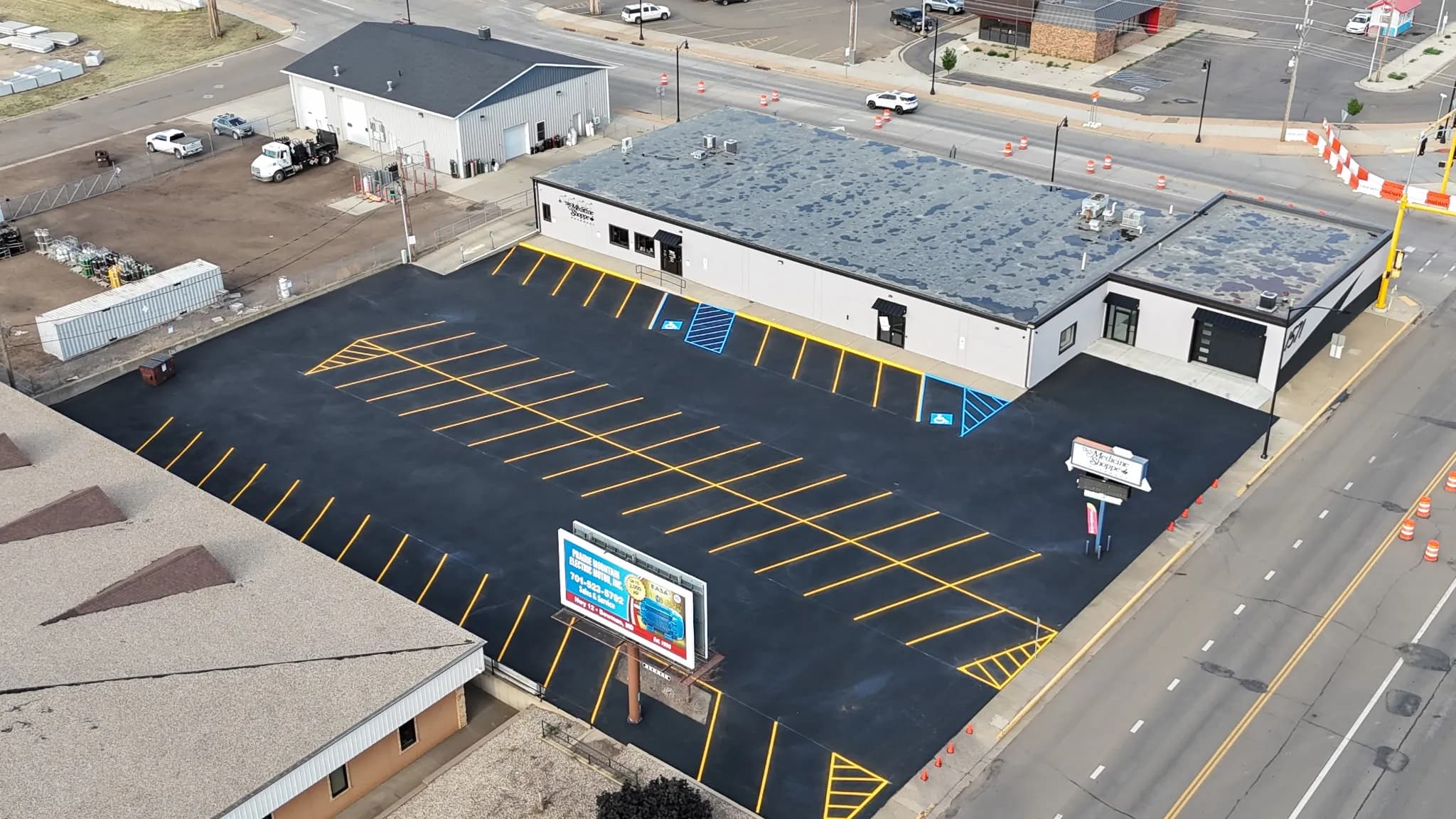 Project Parking Lot Sealcoat and Striping at Medicine Shop Dickinson image